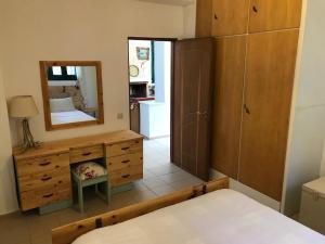 Postel nebo postele na pokoji v ubytování Temenia House