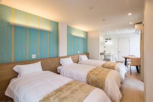 Voodi või voodid majutusasutuse Hotel SAILS toas