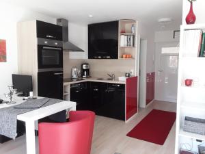 Cuisine ou kitchenette dans l'établissement All-In-One-Studio