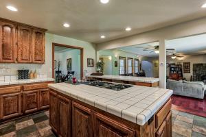 a large kitchen with a counter top in a room at Hope Inn Redding in Redding