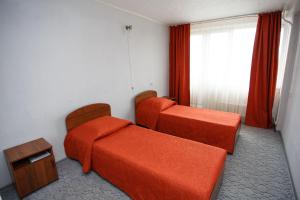 
Кровать или кровати в номере Отель Дружба 
