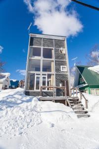 a house in the snow in the snow at Yotei Cottage in Niseko