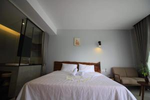 Postel nebo postele na pokoji v ubytování BK Hotel