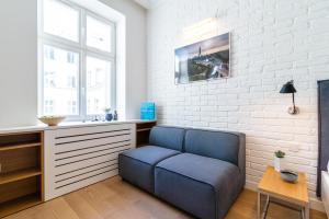 Televízia a/alebo spoločenská miestnosť v ubytovaní Noakowskiego 16 - Premium Designed Apartments by Noclegi Renters