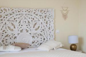 Postel nebo postele na pokoji v ubytování Villa dei Ginepri