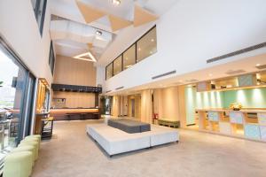 Postel nebo postele na pokoji v ubytování Hotel Liyaou