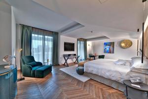 Voodi või voodid majutusasutuse Esplanade Tergesteo - Luxury Retreat toas