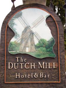 a sign for the dutch mill hotel and bar at The Dutch Mill Hotel in Aberdeen