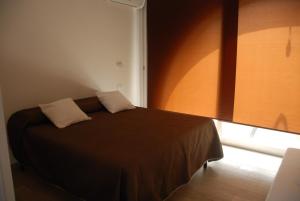 Posteľ alebo postele v izbe v ubytovaní Villa sul porto + 27 fotografií