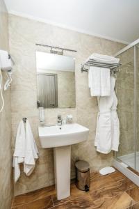Koupelna v ubytování Bien hotel