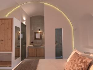 Cama o camas de una habitación en Elysian Santorini