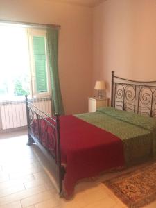 Cama ou camas em um quarto em Villa Laura