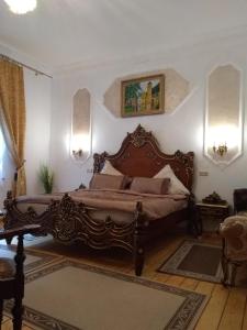 Tempat tidur dalam kamar di Villa Imperia, Museums-Hotel