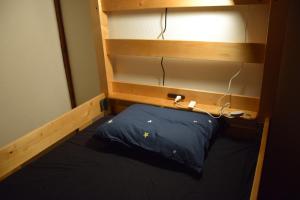 Postel nebo postele na pokoji v ubytování Guest house SHIE SHIMI