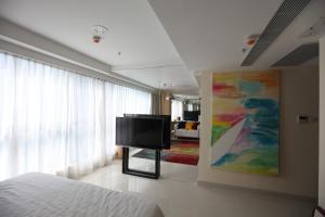TV o dispositivi per l'intrattenimento presso IW Hotel