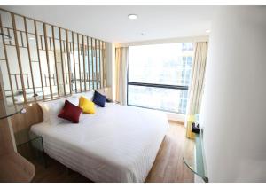 Letto o letti in una camera di IW Hotel