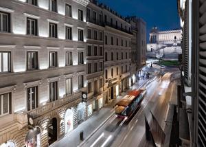 Nespecifikovaný výhled na destinaci Řím nebo výhled na město při pohledu z hotelu