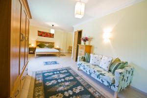 Postel nebo postele na pokoji v ubytování Villa D'Louca + 18 fotografií