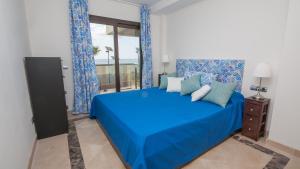 Posteľ alebo postele v izbe v ubytovaní Marina del Castillo 316 + 18 fotografií