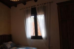 Postel nebo postele na pokoji v ubytování Finca El Chaparral