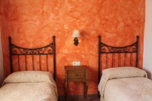 Postel nebo postele na pokoji v ubytování Finca El Chaparral