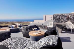Zona de estar de Elysian Santorini