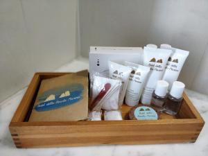 a wooden box filled with products on a table at Hotel Della Piccola Marina in Capri
