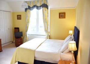 Cama o camas de una habitación en Esseborne Manor