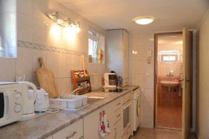 Køkken eller tekøkken på Villa Panorama + 99 billeder