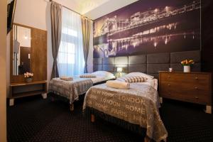 Posteľ alebo postele v izbe v ubytovaní Boogie ApartHouse Old Town