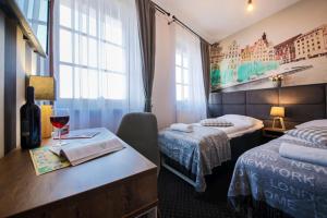 Posteľ alebo postele v izbe v ubytovaní Boogie ApartHouse Old Town