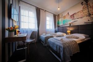 Posteľ alebo postele v izbe v ubytovaní Boogie ApartHouse Old Town