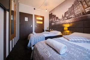 Posteľ alebo postele v izbe v ubytovaní Boogie ApartHouse Old Town