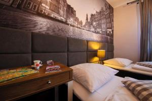 Posteľ alebo postele v izbe v ubytovaní Boogie ApartHouse Old Town