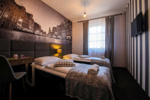 Posteľ alebo postele v izbe v ubytovaní Boogie ApartHouse Old Town