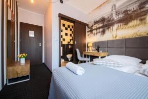 Posteľ alebo postele v izbe v ubytovaní Boogie ApartHouse Old Town