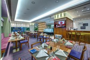 Un restaurant sau alt loc unde se poate mânca la J5 RIMAL Hotel Apartments