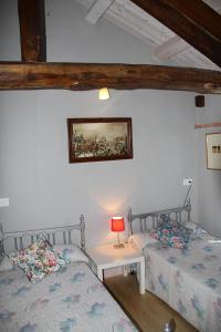 Postel nebo postele na pokoji v ubytování Casa Candana