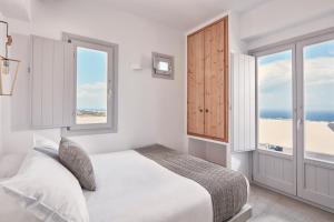 Cama o camas de una habitación en Elysian Santorini