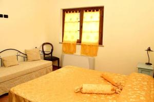 A bed or beds in a room at AgriResort Spa Glamping Poggio Di Montedoro