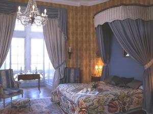Un ou plusieurs lits dans un hébergement de l'établissement Château de la Flocellière