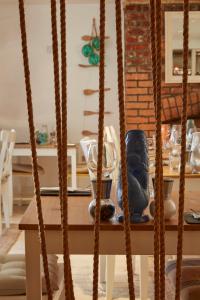 a table with ropes in a dining room at Lulworth Lodge in Lulworth Cove