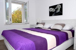 Кровать или кровати в номере Villa Mambo