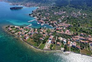 an aerial view of a small island in the water at Olive's Hug in Poljana