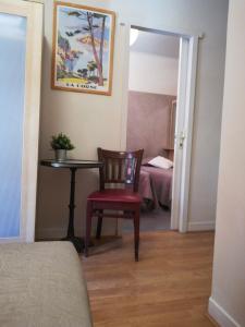 Postel nebo postele na pokoji v ubytování Hôtel Le Foch