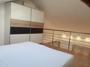 Postel nebo postele na pokoji v ubytování Apartments Villa Maslinica