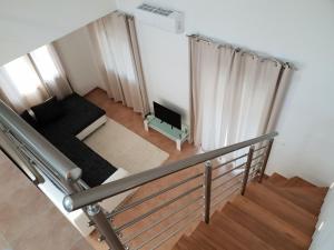 Postel nebo postele na pokoji v ubytování Apartments Villa Maslinica