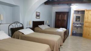 Tempat tidur dalam kamar di Albergo Seaside