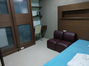 Letto o letti in una camera di 永春棧Kozzy Apartment