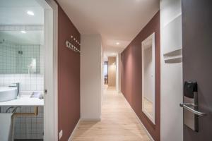 Baðherbergi á Hotel & Aparthotel Cosmos